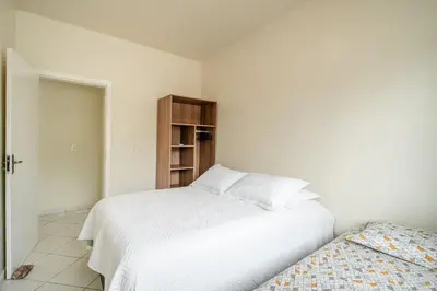 Uma cama ou camas num quarto em Casa com 04 dormitórios
