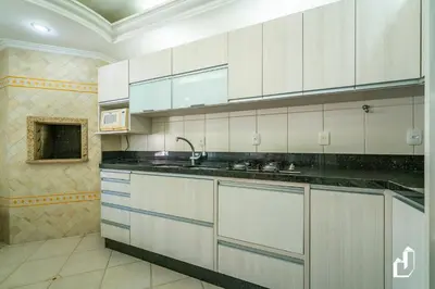 A cozinha ou kitchenette de Casa com 05 dormitórios ideal as férias na praia