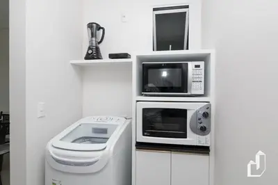 A cozinha ou kitchenette de Com 02 dormitórios a poucos passos da praia