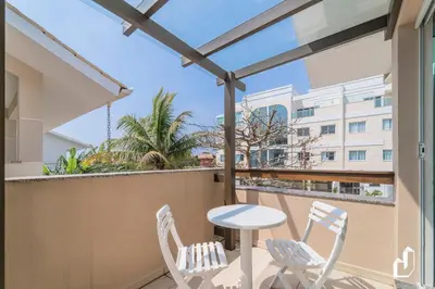 Uma varanda ou terraço em 1 Quarto | Canto Grande | 70m Praia