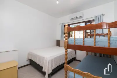 Uma cama ou camas num quarto em Casa térrea com 03 dormitórios
