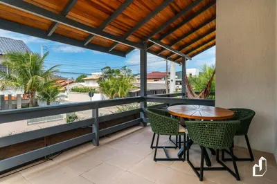 Uma varanda ou terraço em Casa acolhedora e confortável com 03 dormitórios