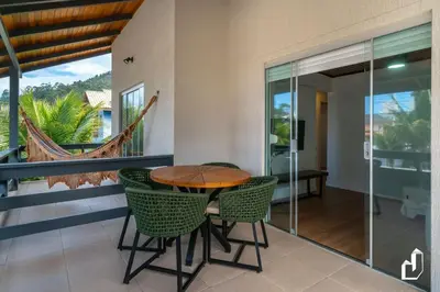 Uma varanda ou terraço em Casa acolhedora e confortável com 03 dormitórios