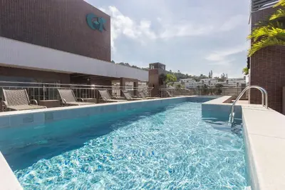 A planta de Porto Madero 204 – Apartamento Moderno em Condomínio com Piscina e Academia no Rooftop no Centro de Bombinhas.
