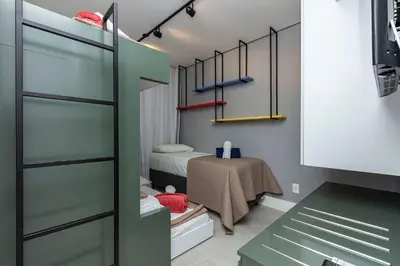 A planta de Porto Madero 202 – Apartamento Moderno em Condomínio com Piscina e Academia no Rooftop no Centro de Bombinhas.
