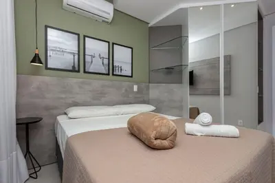 A planta de Porto Madero 202 – Apartamento Moderno em Condomínio com Piscina e Academia no Rooftop no Centro de Bombinhas.