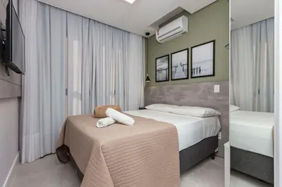 A planta de Porto Madero 202 – Apartamento Moderno em Condomínio com Piscina e Academia no Rooftop no Centro de Bombinhas.