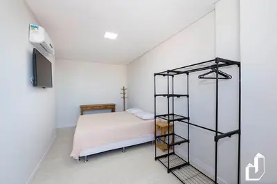 Uma cama ou camas num quarto em Cobertura duplex com piscina e 03 suítes