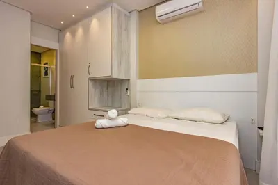 A planta de Porto Madero 305 – Apartamento Moderno em Condomínio com Piscina e Academia no Rooftop no Centro de Bombinhas.
