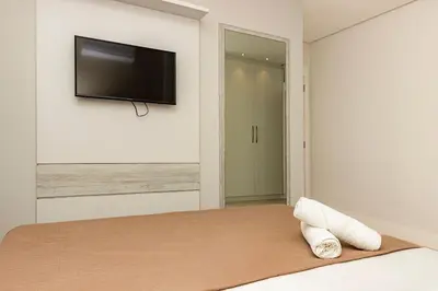 A planta de Porto Madero 305 – Apartamento Moderno em Condomínio com Piscina e Academia no Rooftop no Centro de Bombinhas.