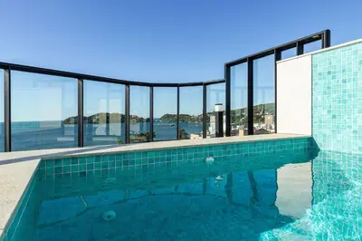 A planta de Aion Suites 303 – Lindo apartamento com Vista para o Mar, a 60m da Praia de Bombinhas, com Piscina e Academia no Rooftop.
