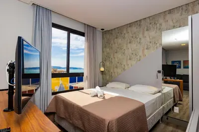 A planta de Aion Suites 303 – Lindo apartamento com Vista para o Mar, a 60m da Praia de Bombinhas, com Piscina e Academia no Rooftop.