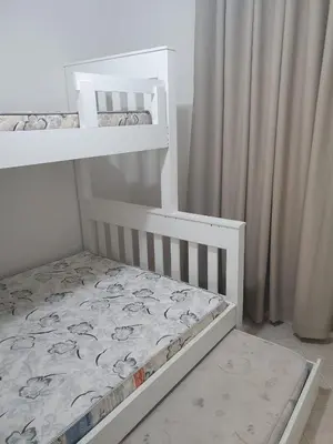 Uma cama ou camas num quarto em 123 Apartamento espaçoso para família