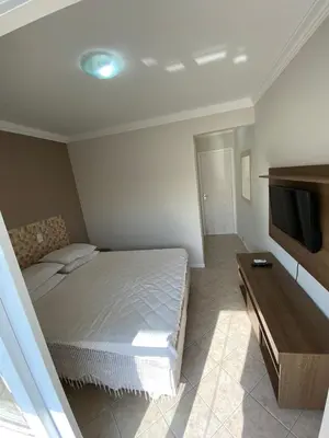 Uma televisão e/ou sistema de entretenimento em 123 Apartamento espaçoso para família