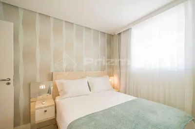 Uma cama ou camas num quarto em Portofino 202 · Aconchegante apto 03 dorms com ótima localização.