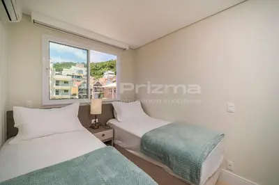 Uma cama ou camas num quarto em Portofino 202 · Aconchegante apto 03 dorms com ótima localização.