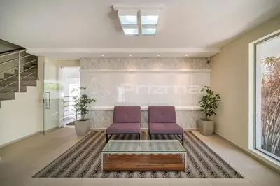 Uma área de estar em Portofino 202 · Aconchegante apto 03 dorms com ótima localização.