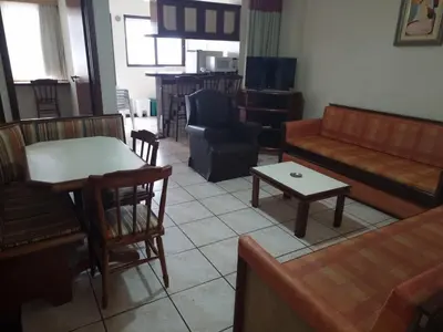 Uma área de estar em Hotel Residencial Itapema