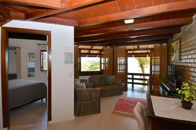 Uma cama ou camas num quarto em BANGALÔ CASA GRANDE - EXCLUSIVIDADE, CONFORTO E PRIVACIDADE.