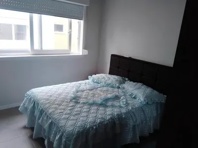 Uma cama ou camas num quarto em Palm Ville paraíso de Palmas com elevador e piscina