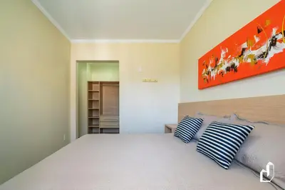 Uma cama ou camas num quarto em Apartamento com 02 dormitórios