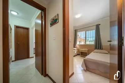 Uma cama ou camas num quarto em Apartamento com 02 dormitórios