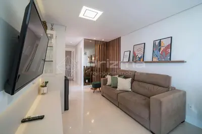 Uma televisão e/ou sistema de entretenimento em Varandas 303 A · Luxuoso Apartamento em Condomínio de Alto Padrão frente mar