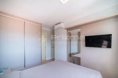 Uma televisão e/ou sistema de entretenimento em Varandas 303 A · Luxuoso Apartamento em Condomínio de Alto Padrão frente mar