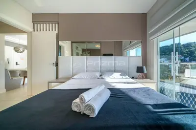 Uma cama ou camas num quarto em Mario Guilherme - Apto - 301 - Lindo apartamento condomínio de alto padrão com piscina e academia.