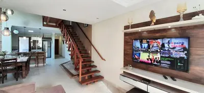 Uma televisão e/ou sistema de entretenimento em Casa 4 quartos com piscina AQUECIDA em Bombinhas