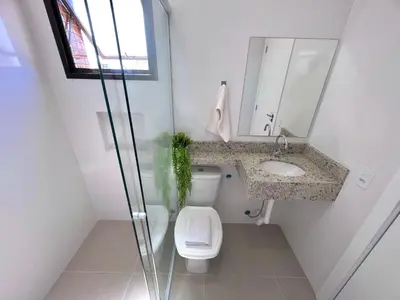 Uma casa de banho em Bella Catarina Bombinhas