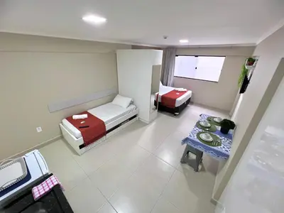 Uma cama ou camas num quarto em Bella Catarina Bombinhas