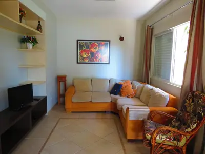 Uma área de estar em 411- Casa para 8 pessoas 20 metros da Praia Central em Bombinhas