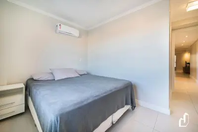 Uma cama ou camas num quarto em Kremer Residence - Apartamento 303