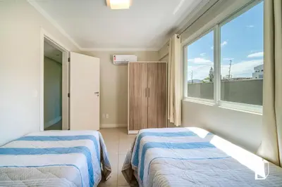 Uma cama ou camas num quarto em Kremer Residence - Apartamento 203