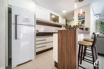 A cozinha ou kitchenette de Kremer Residence: Apto 202 amplo próximo ao mar