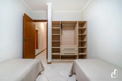 Uma cama ou camas num quarto em Residencial Maresias - Térreo com 02 dormitórios