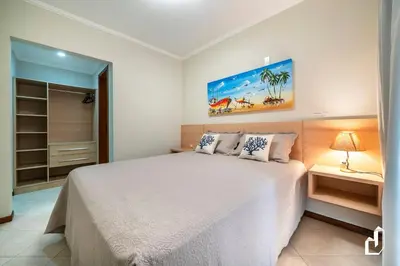 Uma cama ou camas num quarto em Residencial Maresias - Térreo com 02 dormitórios