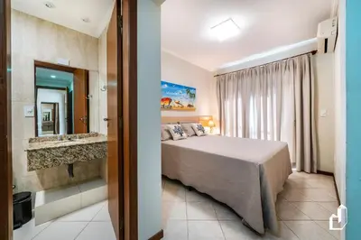 Uma cama ou camas num quarto em Residencial Maresias - Térreo com 02 dormitórios