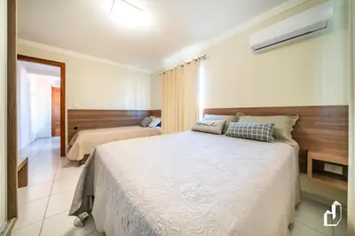 Uma cama ou camas num quarto em Aqui tudo contribui para felicidade e o bem-estar