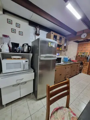 A cozinha ou kitchenette de Apartamento estilo chalé - Enxaimel