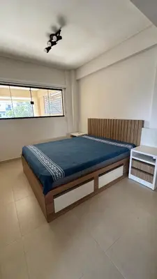 Uma cama ou camas num quarto em Lindo Apartamento no Mariscal, Bombinhas, com estacionamento e quintal, a 290 metros da praia do Canto Grande!!!