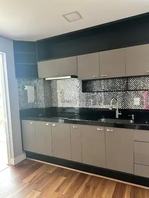 A cozinha ou kitchenette de Apartamento com 2 quartos luxuoso e confortável em Itapema