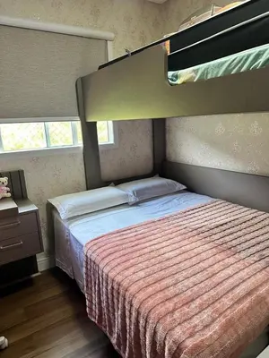 Uma cama ou camas num quarto em Apartamento com 2 quartos luxuoso e confortável em Itapema