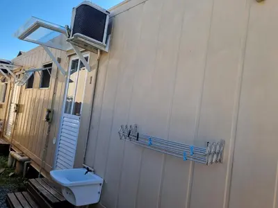 Uma televisão e/ou sistema de entretenimento em Espaço Container Itapema - Loft I