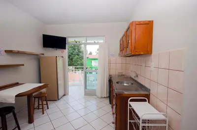 A cozinha ou kitchenette de Pousada Canto das Pedras