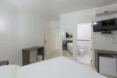 Uma cama ou camas num quarto em Pousada Oásis de Mariscal