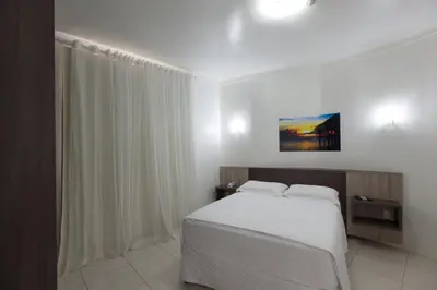 Uma cama ou camas num quarto em Pousada Oásis de Mariscal