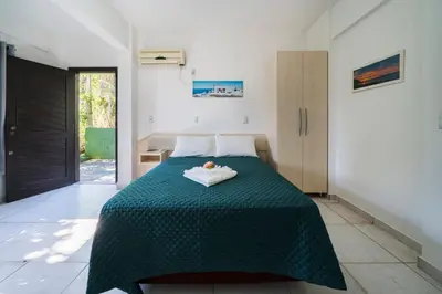 Uma cama ou camas num quarto em Pousada Albacora