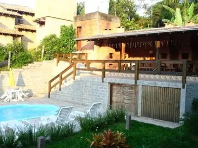 A piscina em ou perto de Pousada Guaruja